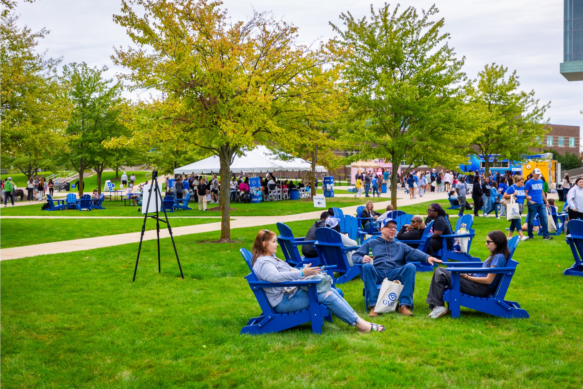 family sitting on the kirkhof lawn